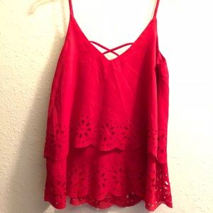 Red sleeveless blouse